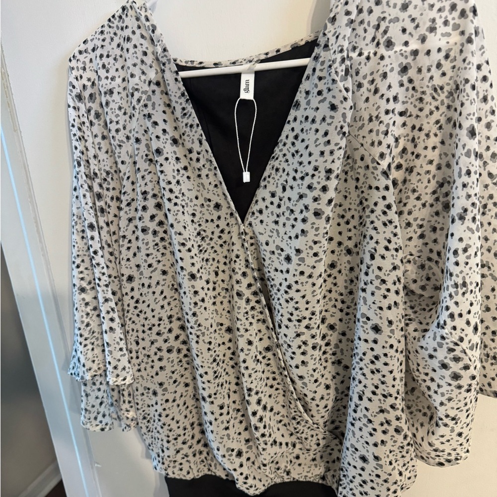 Black and white dotted body suit